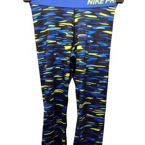 Nike Pro Women's Neon Splash Crop Tights. Size XS. Color is Blue, Black, Lime.